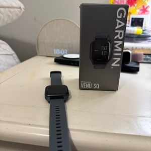 brand new, never used Garmin Venu SQ smartwatch with GPS
